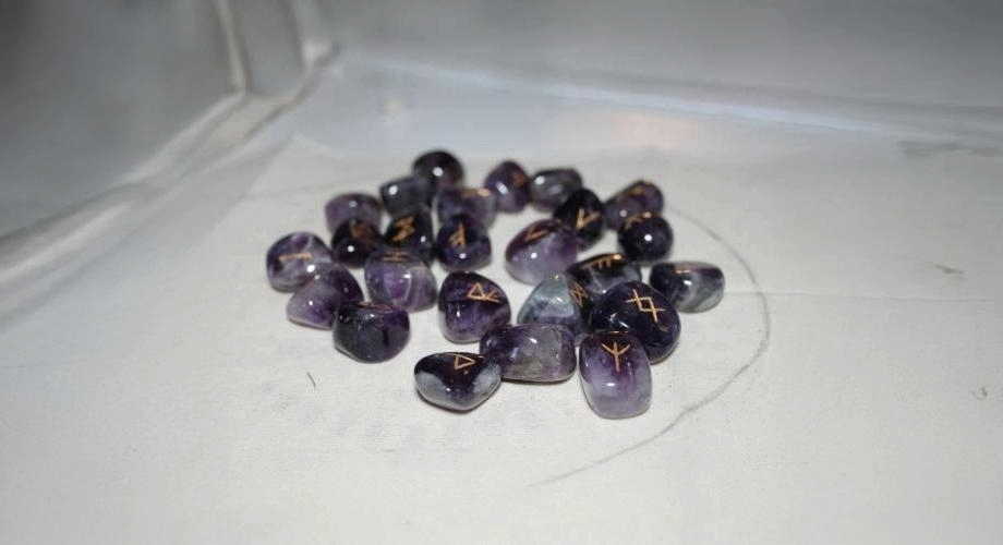 Hands pointing to a deck of cards